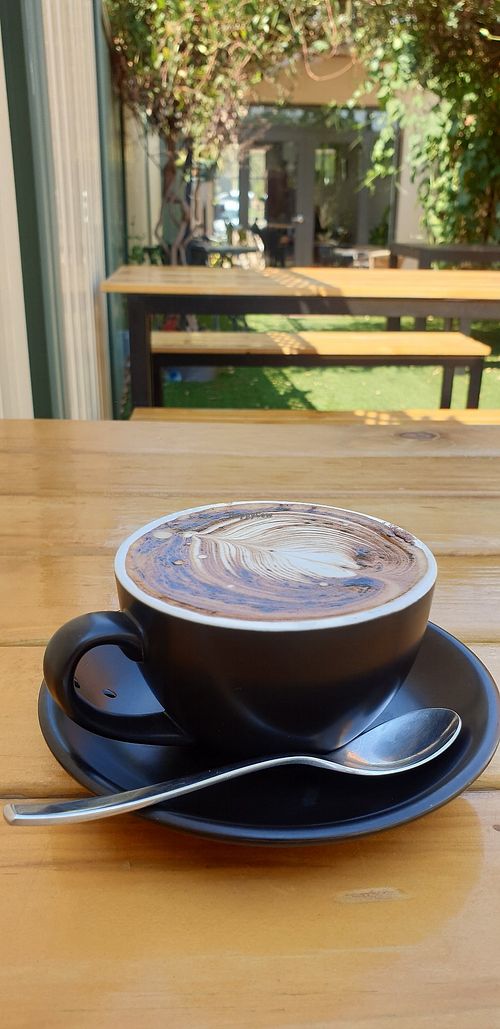 Coffee in the courtyard at Mint and Jam in Yea