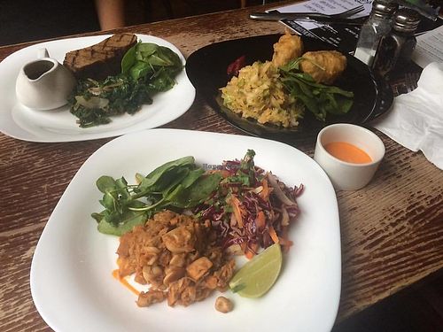 Top Left: Vegan Seitan 'Fillet Steak' with kale; Top Right: Beer Battered Vegan 'Haggis' with Sauerkraut, Bottom: Vegan 'Pulled Pork' with Street Food Salad.  Hard to pick a favourite! at Two Wolves Kitchen in Brighton
