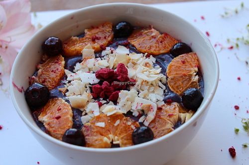 Cherry Berry Smoothie Bowl - topped with Pure Joy Granola (grain-free) served with your choice of 1 fruit + 1 superfood topping at Pure Joy Kitchen in Bend