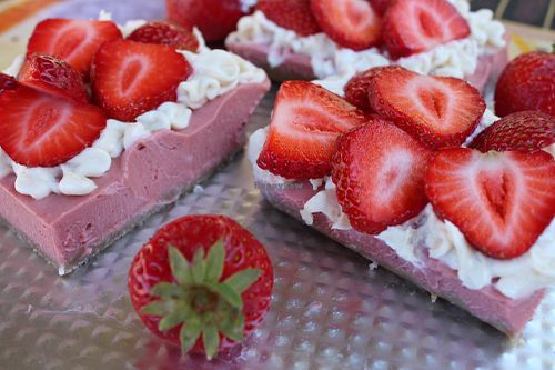 Strawberry D R E A M B A R S are back! Need a decadent summer dessert to bring to your long weekend party? These creamy dreamy coconut, strawberry, vanilla bean topped with fresh organic strawberries and our 'sky high' coconut whipped cream treats are sure to turn heads...even for those who are not gluten or dairy free! at Pure Joy Kitchen in Bend