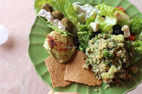 MEDITERRANIN PLATTER - quinoa parsley mint tabouli with hemp hearts, no-bean hummus, greek salad, cultured herb cheese, #sprouted buckwheat pita chips. Nosh and nourish  at Pure Joy Kitchen in Bend