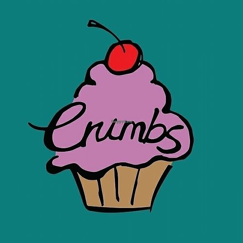 company logo at Crumbs Vegan Bakery in Moira