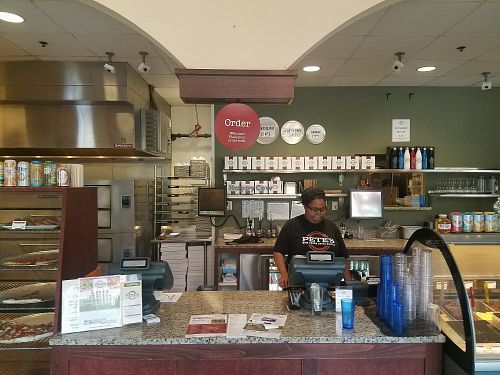 the counter where you order at Pete's New Haven Style Pizza in Arlington