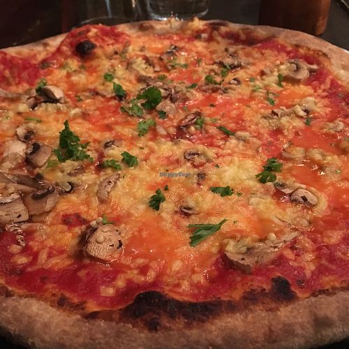 Pizza Funghi with vegan cheese at Vaelsa in Helsinki