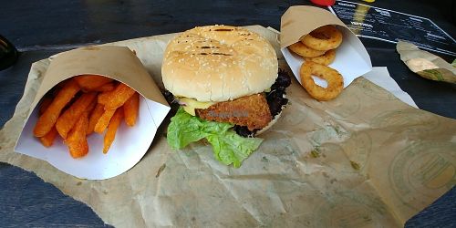seitan schnitzel with sweet potato fries and onion rings at Vburger Camden in North West London