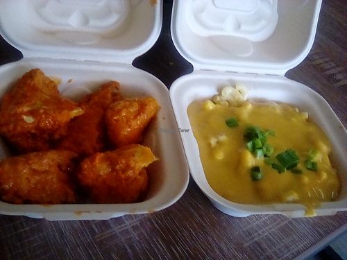 Cauliflower wings, Creamy Mac & Cheese to go.  at Dajen Eats in Eatonville