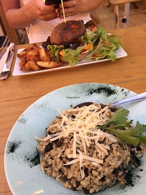Vegan burger with chips and risotto at Simbiosis in Ibiza