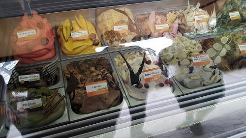 The vegan options have little green signs in the corners at Almas Terrasse - Bakken Amusement Park in Klampenborg