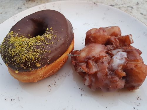 Apple fritter and dark chocolate + pistachio doughnut at Holy Donut - Vokiečių in Vilnius