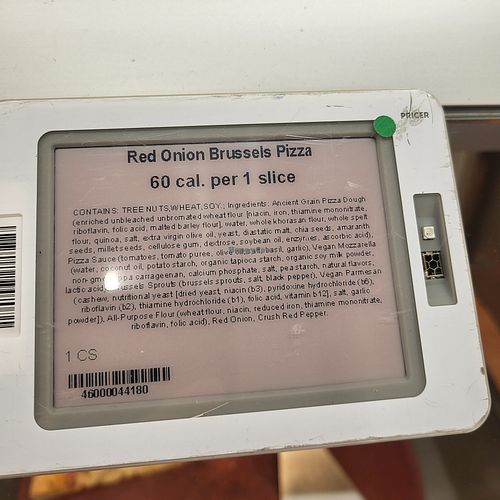 Not labeled vegan pizza. Pretty sure it's way over 60 calories. at Whole Foods Market in Cedar Park