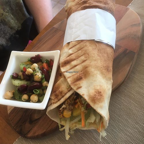 burger and mixed salad in a toasted wrap with a small bean salad  at Envy Vegetarian Eatery in Blyton
