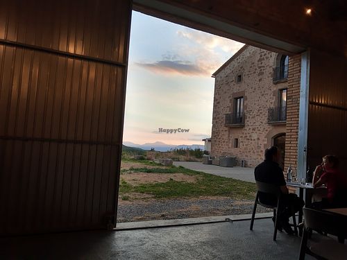 Indoor outdoor seating at Casa Albets in Lladurs