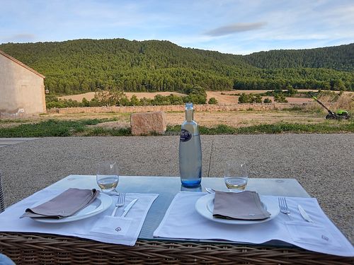 Outdoor seating at Casa Albets in Lladurs