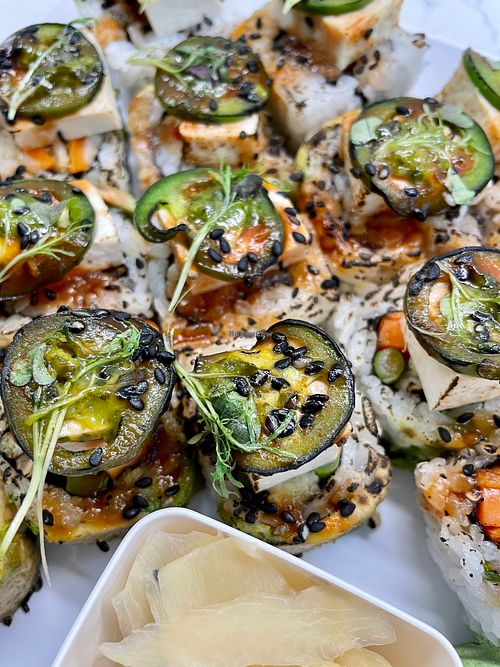 Sweet Potato Tempura, Shiitake Mushrooms & Asparagus
Topped w/ avocado, tofu, seared jalapeños, ankake sauce, cilantro vinaigrette, black sesame & micro greens.  Our favorite!  at Sushi 2 in San Diego