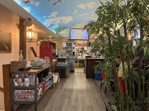 Back of the restaurant, facing kitchen and counter at Saigon Lotus in Toronto