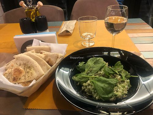 Broccoli risotto and rosemary focaccia  at Alouette in Bucharest
