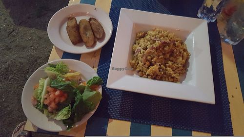 Vegetarian paella, salad, and amarillos (fried plantains) at Bili  in Vieques