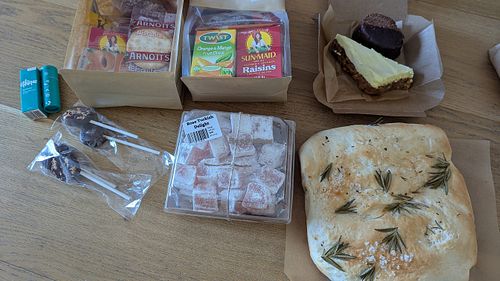 Lip balm, two snack bags, citrus slice & Bounty Bar, focaccia bread, Turkish Delight, chocolate lollies. at Portershed in Christchurch