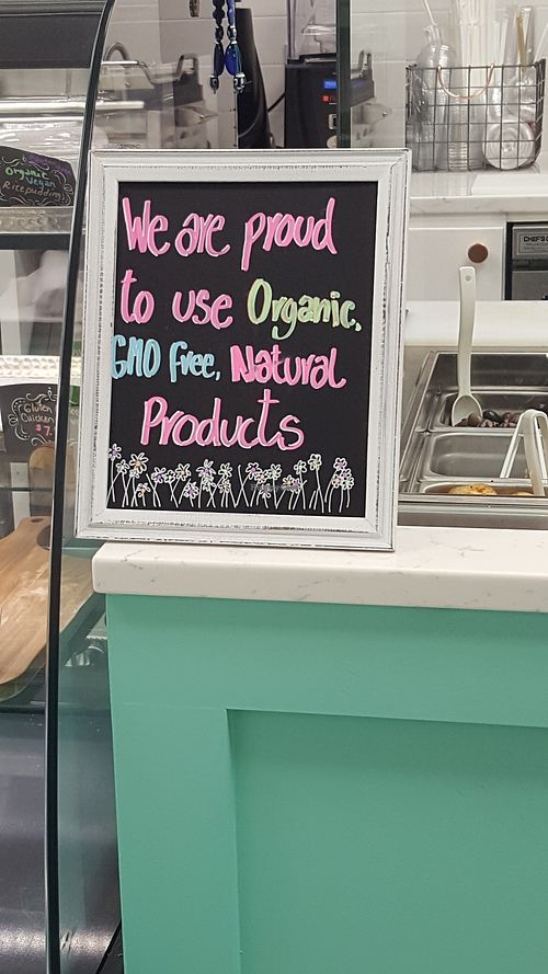 lovely colorful sign displayed by the food.  at Blend Cups Organic in Hackensack