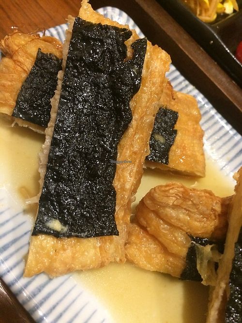 stuffed tofu fried skin with nori seaweed and lemon. My favorite ! at Hoshina 穗科 - Zhongshan District in Taipei