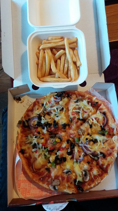 veggie supreme and fries at Zad's in Manchester