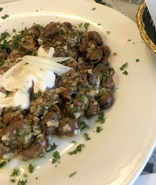 Fava beans topped with tahini  at Mini Pita Cafe in Fort Lauderdale
