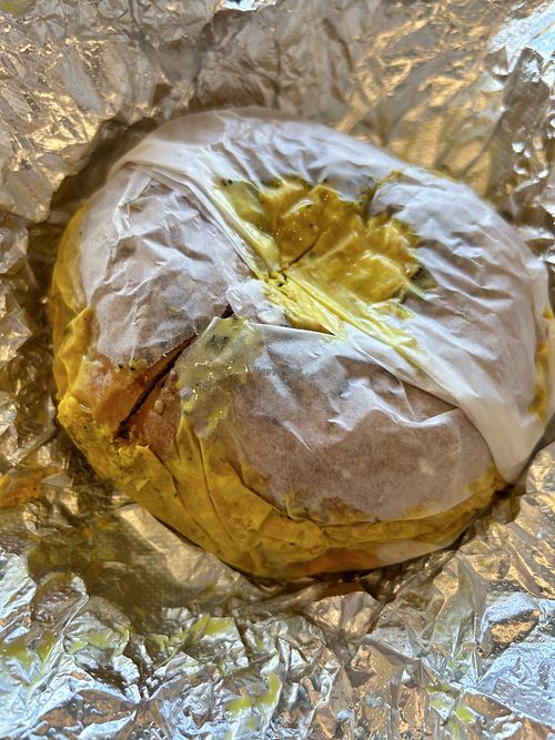 Vegan egg and vegan sausage on a whole-wheat everything bagel   at Bare Naked Bakery in Bellmore