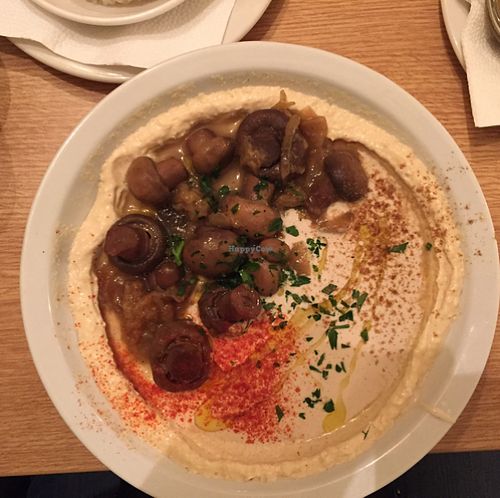 Hummus with onions and mushrooms  at Hummus Bar - Hollan Erno in Budapest