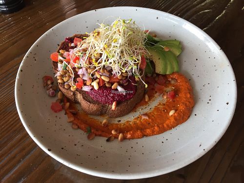 Beetroot Hummus on dark rye with brown lentil salad, harissa, toasted pine nuts and avocado instead of haloumi at The Silly Goat in Broken Hill