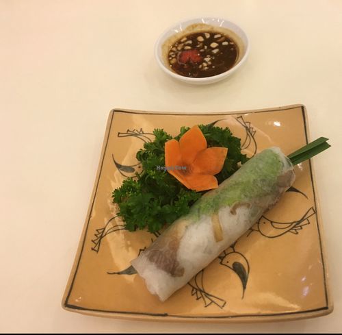 one spring roll 10,000 VND, lovely decorated at Loving Hut - Hoa Dang in Ho Chi Minh City