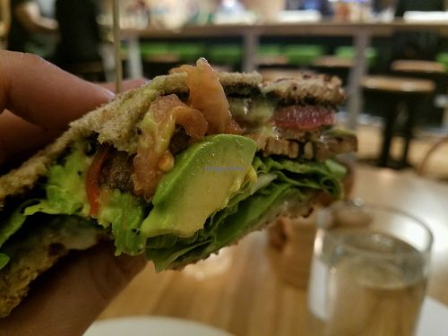 TLT sandwich with too-tangy vegan mayo and bread seemingly made of seeds floating in suspended state at True Food Kitchen in Bethesda