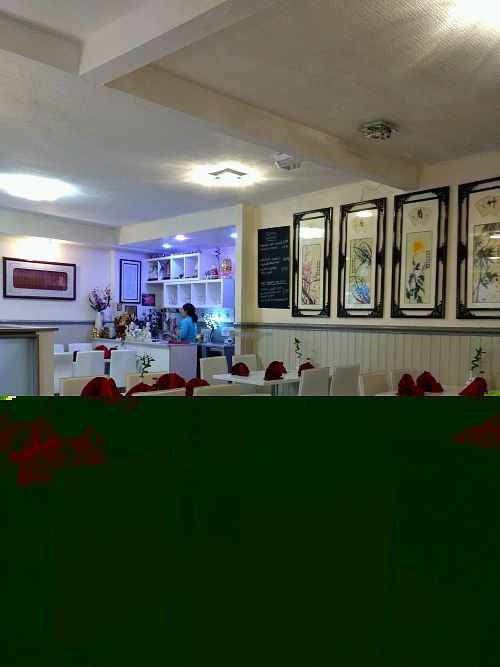 ten tables with a capacity of about 50 at To Be Vegetarian Blackburn in Blackburn