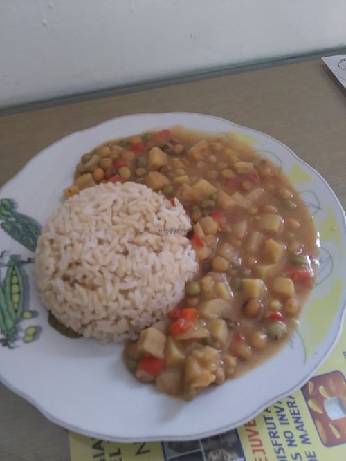 Brown rice and mixture of beans peas carrots and potatoes at Govinda in Chiclayo