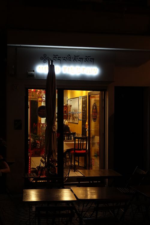 Entrance with outdoor seating at Momos Tibetain in Strasbourg