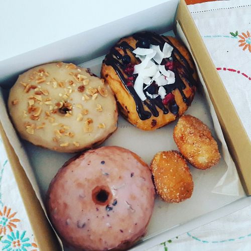 Vegan donuts: lavender, peanut butter, filled with raspberry and blueberry jam, cinnamon balls. at Donut Shop in Prague
