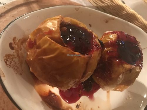 Baked apple with berrie jam and nut filling at Propaganda  in Chisinau
