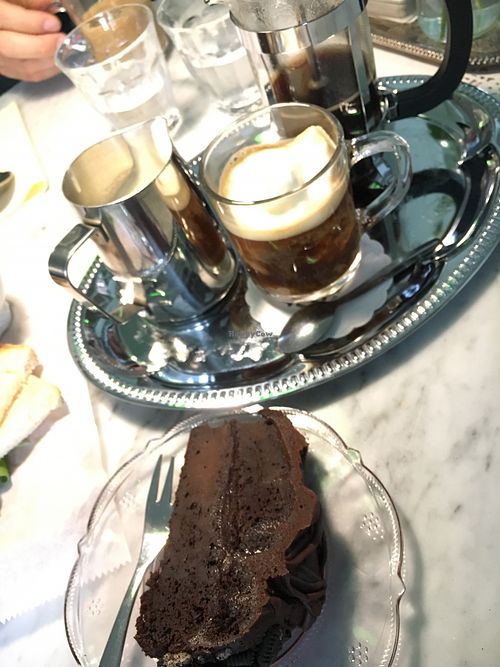 vegan chocolate cake with French press coffee and steamed soy milk  at Julia & Julia in Reykjavik