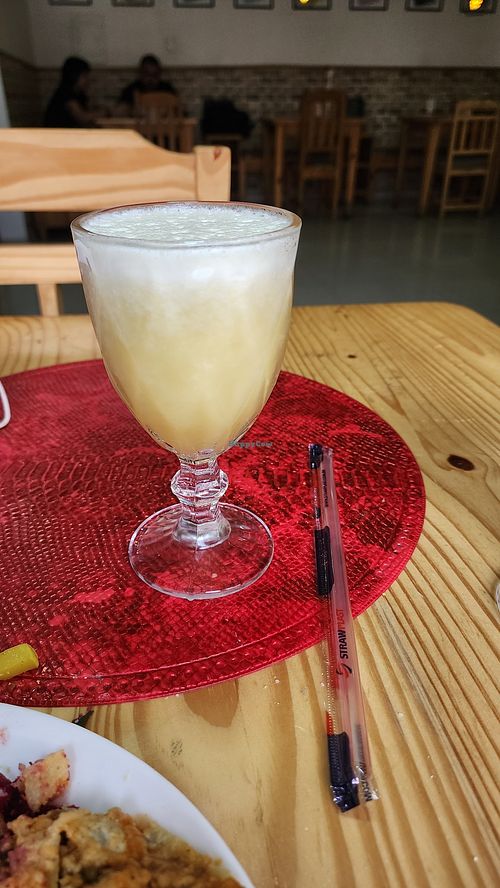 pineapple, ginger and apple drink. too much foam at Edi Sabor Natural in Manaus