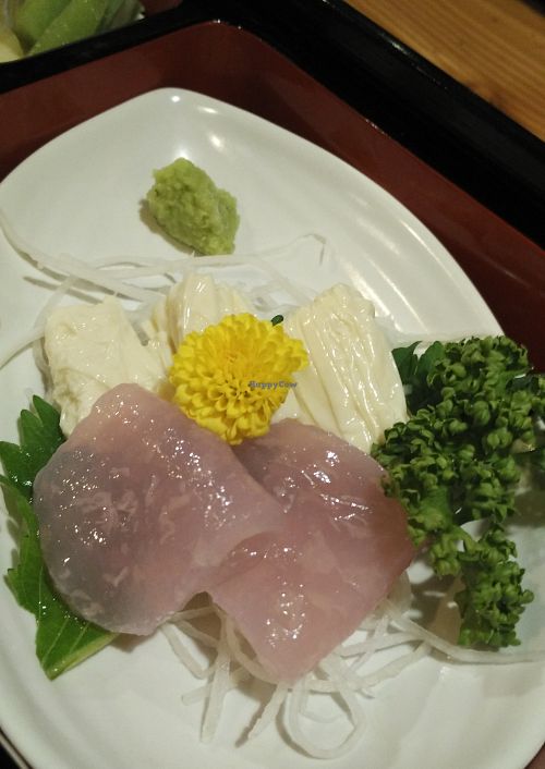 Two varieties of vegan sashimi: yuba and konyaku, served with a little wasabi. The fish-looking sashimi is made from konyaku (a type of yam) and is chewy. at Bell Cafe in Nikko