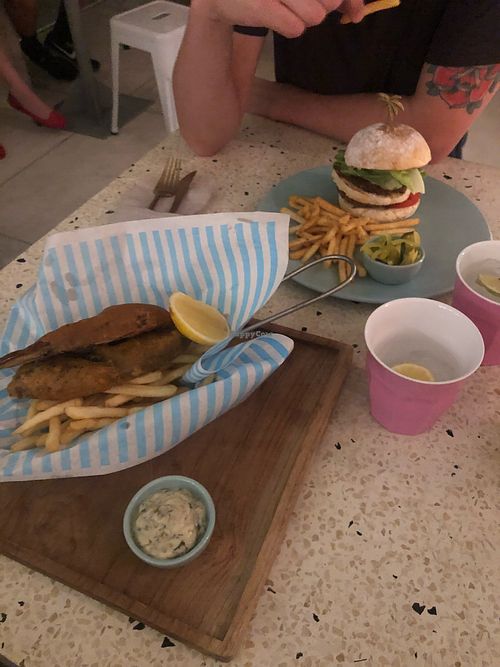 Banana leaf fish and chips and a burger  at Kynd Community - Seminyak in Seminyak