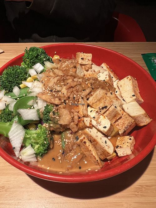This bowl is a cubed sweet potato base, which was so good! Tofu and loaded with veggies and a peanut sauce   at Tokyo Joe's in Greeley