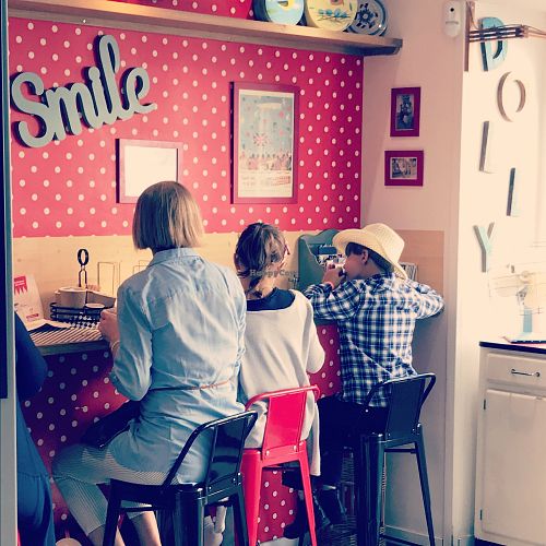 A small area to eat (4 stools) although it's mostly takeout. The castle is right next door for picnics on the grass. at Dollys2go in Caen