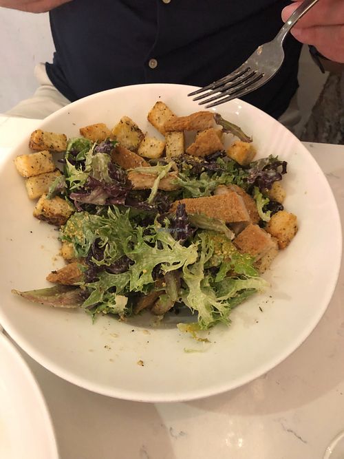 caesar salad with crispy chicken at P.S. Kitchen in New York City