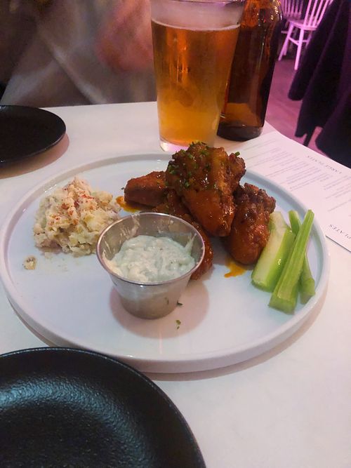 Wings and mashed potatoes  at P.S. Kitchen in New York City
