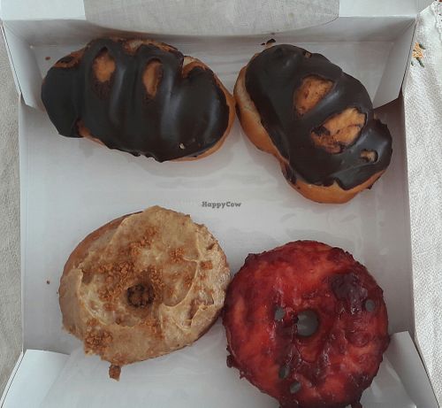 Vegan eclairs and donuts at Blue Vegan Pig Shop in Prague