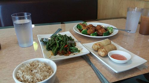 spring rolls, string bean appetizer, orange peel veg meat, and a special noodle soup made with ginger and tomato. at Ma Ma Wok in Charlotte