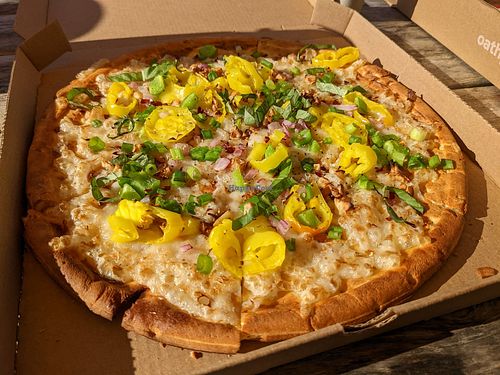 Personal banza crust with garlic oil, vegan cheese, banana peppers, roasted garlic, green bell peppers, scallions, basil, oregano, red pepper flakes. at Oath Pizza in Nantucket