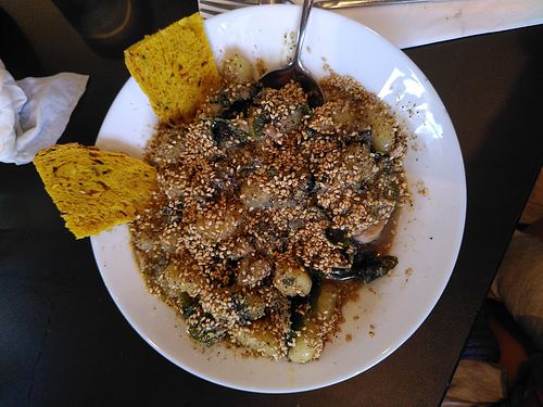 Gnocchis with seaweed and mushrooms (with turmeric bread on the side, my son ate all the bread ahah) at Vegan Yes in East London