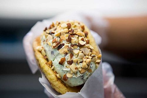 ice cream sandwich with nut topping  at CREAM in Weston