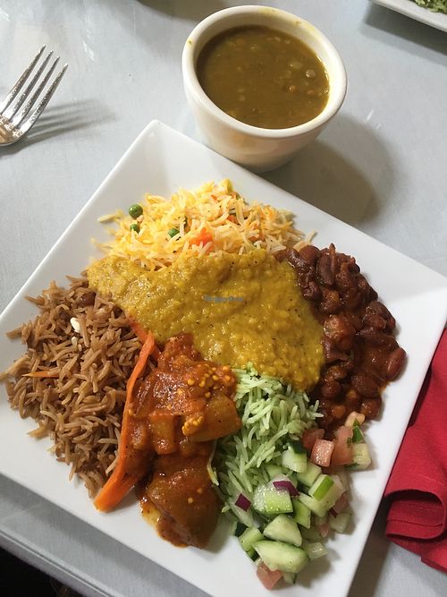 Lunch buffet: 3 types of rices, spicy beans, cucumber salad, and eggplant. And lentil soup. at Babur Garden in Ocean Township